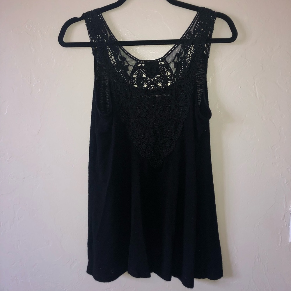 Black tank top with open back design